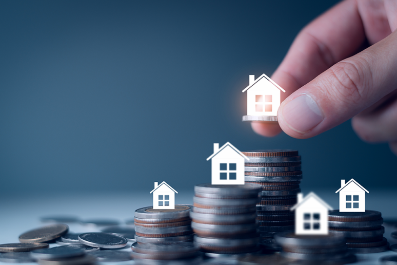 Foto: Münzen und Haus-Icons